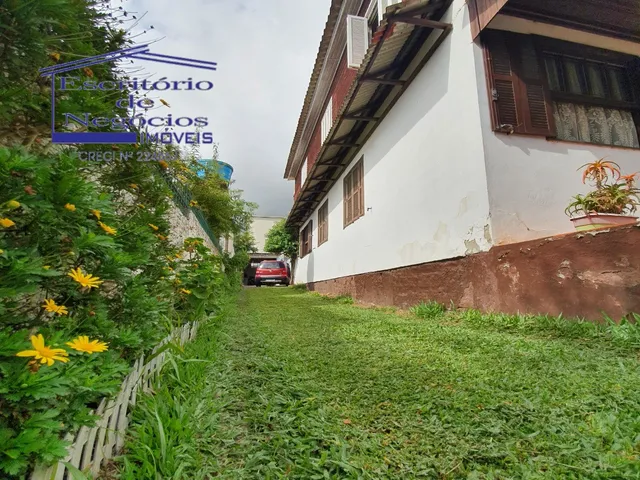 Imagem 2: Casa à venda em Porto Alegre-RS, bairro Cavalhada, 3 quartos, 2 salas, 3 banheiros, 4