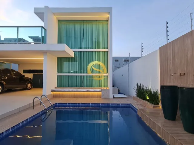 Imagem: A casa possui 4 Dormitórios, 4 Suítes, 2 Banheiros, 5