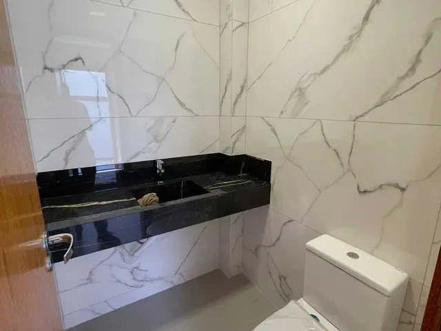 Imagem 7: Casa com 2 dormitórios sendo 2 suítes e 2 vagas de garagem em Palhoça/SC