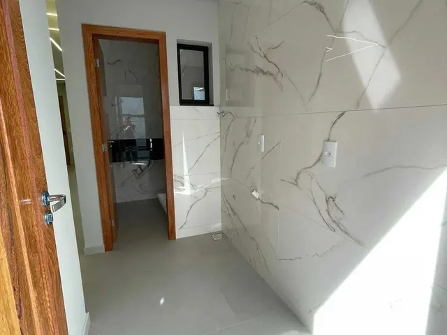 Imagem 9: Casa com 2 dormitórios sendo 2 suítes e 2 vagas de garagem em Palhoça/SC