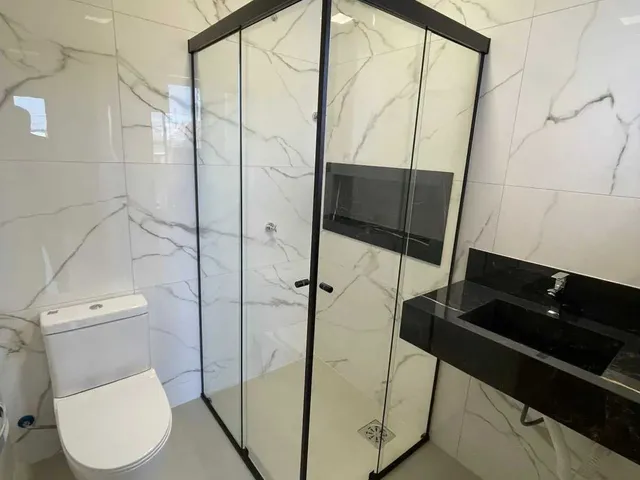 Imagem 16: Casa com 2 dormitórios sendo 2 suítes e 2 vagas de garagem em Palhoça/SC