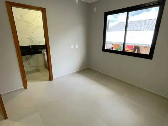 Imagem 10: Casa com 2 dormitórios sendo 2 suítes e 2 vagas de garagem em Palhoça/SC
