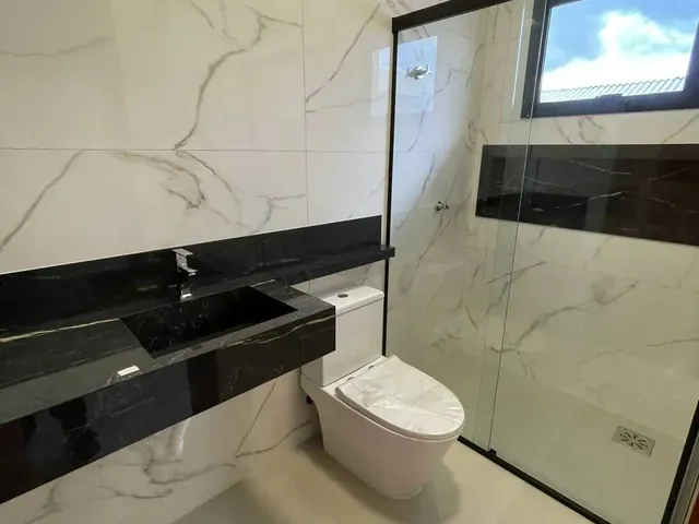 Imagem 11: Casa com 2 dormitórios sendo 2 suítes e 2 vagas de garagem em Palhoça/SC