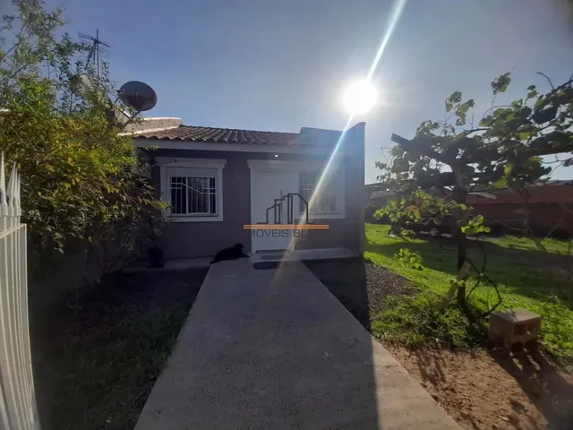 Imagem: A casa possui 3 Dormitórios, 1 Banheiro, 3 Vagas na
