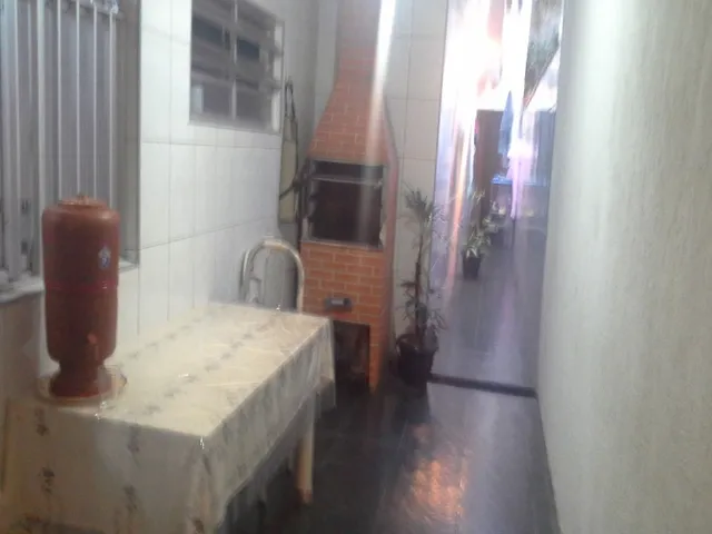 Imagem: A casa possui 2 Dormitórios, 1 Banheiro, 2 Vagas na