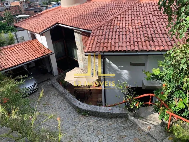 Imagem: A casa possui 4 Dormitórios, 4 Suítes, 6 Banheiros, 3