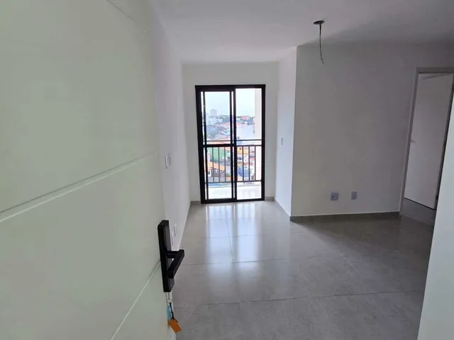 Imagem: O apartamento possui 2 Dormitórios, 1 Suíte, 2 Banheiros,