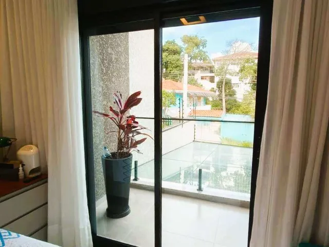 Imagem 5: Sobrado moderno com 3 suítes, 2 vagas e área gourmet próximo ao Terminal Santa Cândida