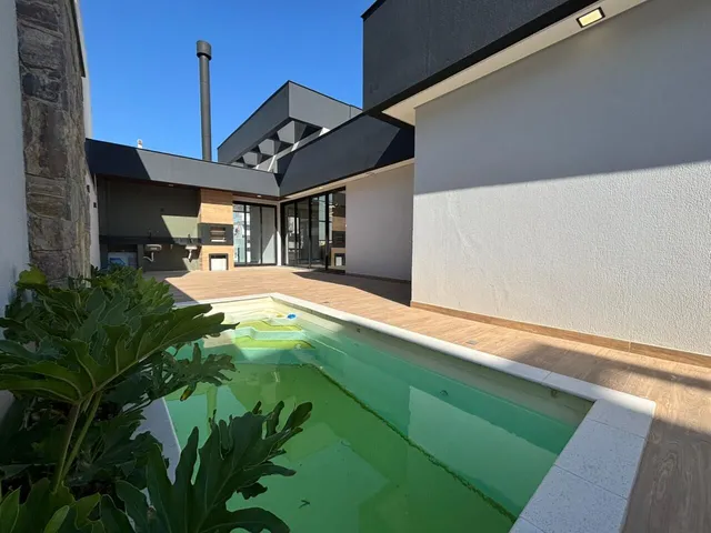 Imagem 10: Casa Deslumbrante com Piscina, Espaço Gourmet e Acabamento Prime (Palhoça/SC)!