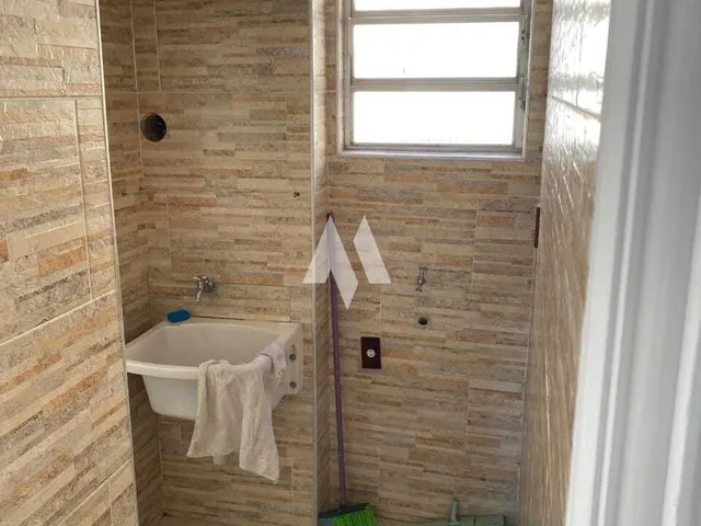 Imagem 5: Apartamento com ambientes funcionais e aconchegantes em São Vicente SP