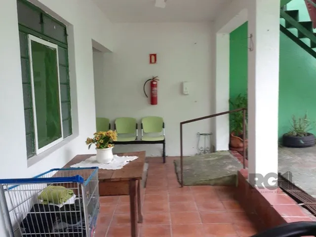 Imagem: Casa com 4 Suítes, Vaga de Garagem, no
