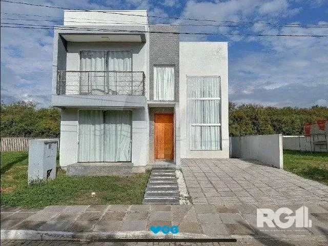 Imagem: A casa possui 2 Dormitórios, 1 Suíte, 2 Banheiros, 2