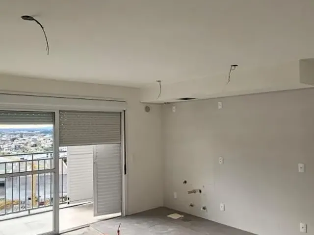 Imagem: O apartamento possui 2 Dormitórios, 1 Suíte, 2 Banheiros,