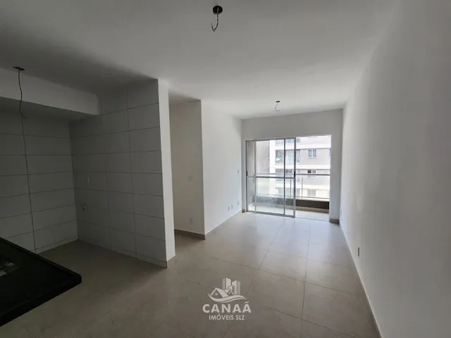Imagem: O apartamento possui 2 Dormitórios, 1 Suíte, 2 Banheiros
