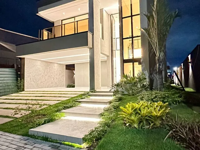 Imagem: A casa em condomínio possui 4 Dormitórios, 4 Suítes, 4 Banheiros