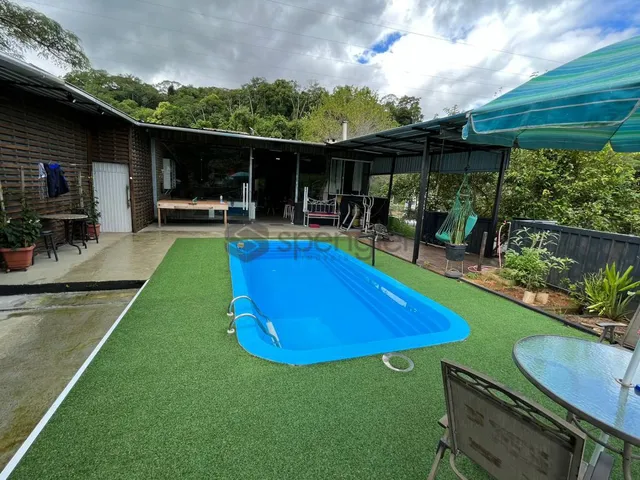 Imagem: Terreno com casas e galpão, Belchior Central
