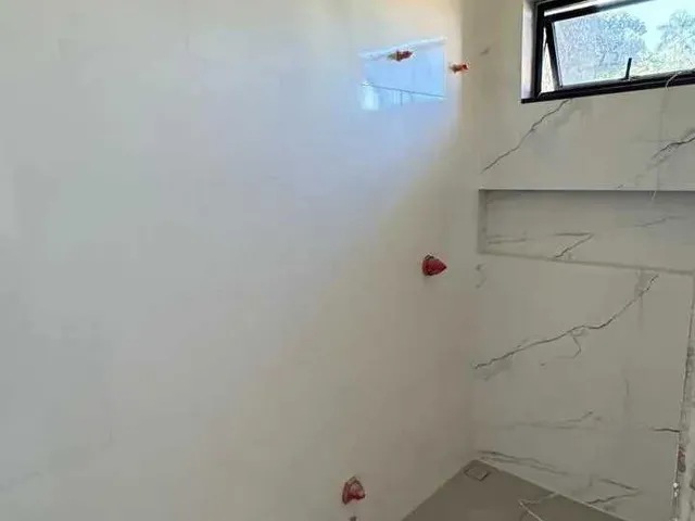 Imagem: A casa possui 3 Dormitórios, 1 Suíte, 3 Banheiros, 2