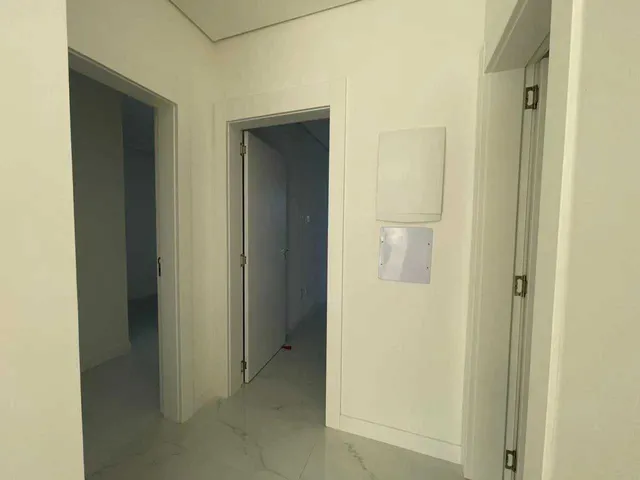 Imagem 2: Apartamento com 2 dormitórios sendo 2 suítes e 1 vaga de garagem em Camboriú/SC
