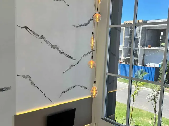 Imagem 4: Casa com 4 suítes sendo 1 master e 4 vagas de garagem - Campeche em Florianópolis/SC