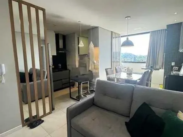 Imagem: O apartamento possui 2 Dormitórios, 1 Suíte, 2 Banheiros,