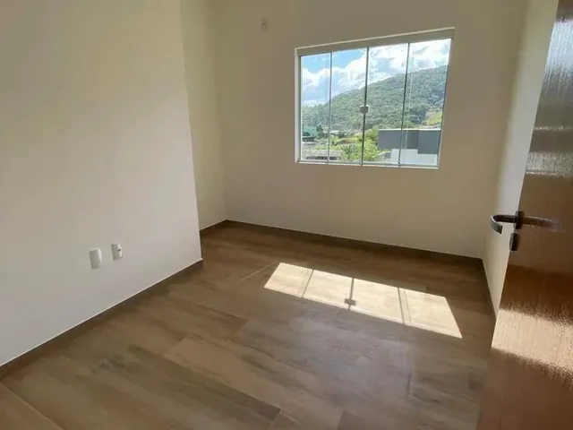Imagem 2: Apartamento com 2 dormitórios sendo 1 suíte e 1 vaga de garagem em Palhoça/SC