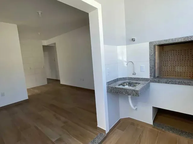 Imagem 16: Apartamento com 2 dormitórios sendo 1 suíte e 1 vaga de garagem em Palhoça/SC