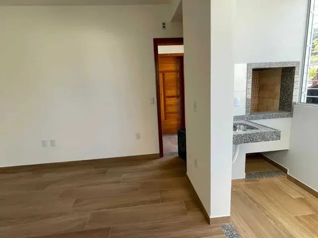 Imagem 10: Apartamento com 2 dormitórios sendo 1 suíte e 1 vaga de garagem em Palhoça/SC