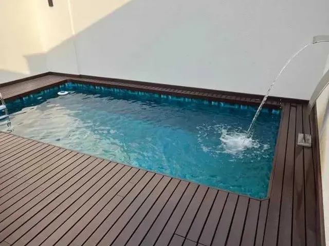 Imagem 2: Casa Alto Padrão com 3 dormitórios sendo 1 suíte master e 2 vagas no América em