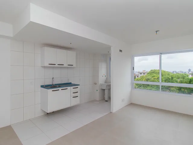 Imagem: O apartamento possui 2 Dormitórios, 1 Banheiro, 1 Vaga na