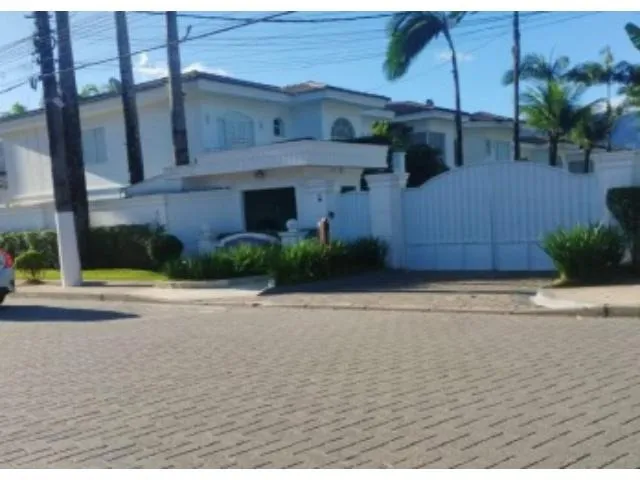 Imagem: A casa em condomínio possui 3 Dormitórios, 3 Suítes, 5
