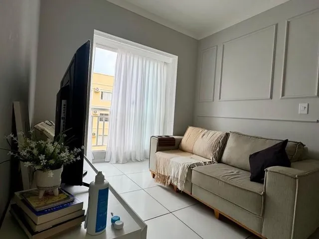 Imagem: O apartamento possui 2 Dormitórios, 1 Suíte, 2 Banheiros