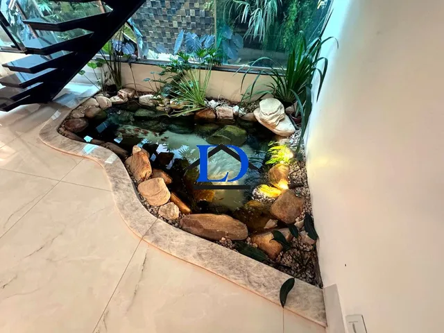 Imagem 13: Sobrado de Alto Padrão à Venda no Jardins Madri - 4 Suítes, 338 m² e Piscina, Pronto