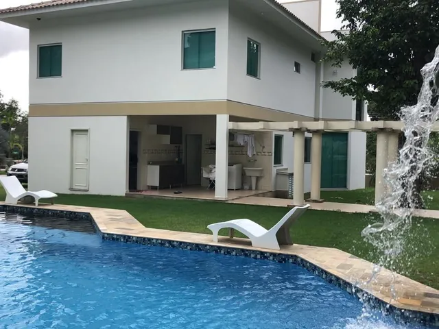 Imagem: A casa em condomínio possui 5 Dormitórios, 5 Suítes, 1