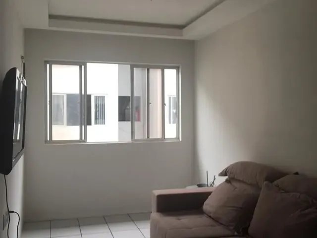 Imagem: O apartamento possui 2 Dormitórios, 1 Suíte, 2 Banheiros