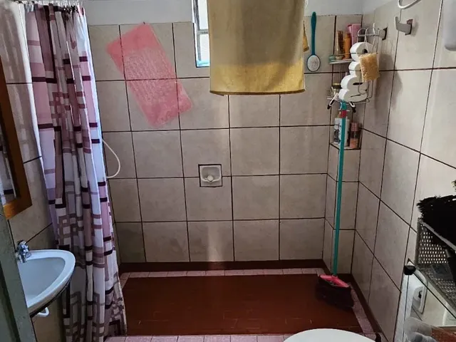 Imagem 4: Casa À Venda no Centro: Ampla Residência com Pátio