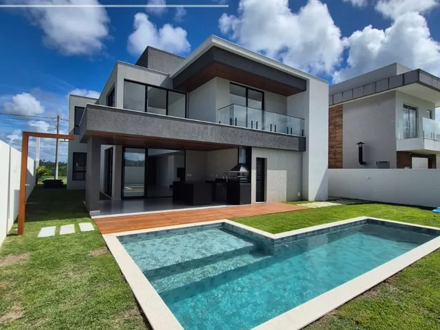 Imagem 2: Casa NOVA em Alphaville III, com 4 suítes e piscina privativa