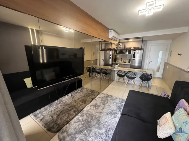 Imagem: O apartamento possui 1 Dormitório, 1 Suíte, 2 Banheiros, 1