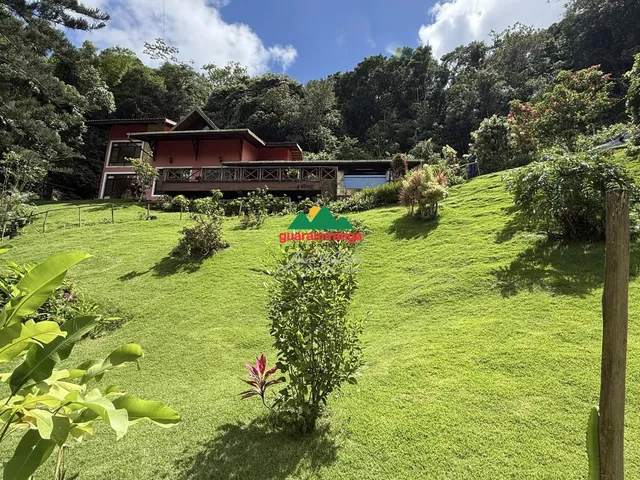 Imagem 11: CASA COM LAGO NO MEIO DA MONTANHA