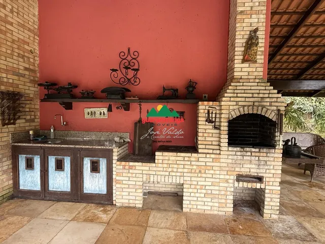 Imagem 5: CASA COM LAGO NO MEIO DA MONTANHA