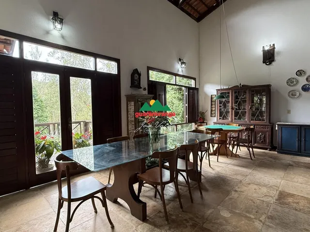 Imagem 2: CASA COM LAGO NO MEIO DA MONTANHA
