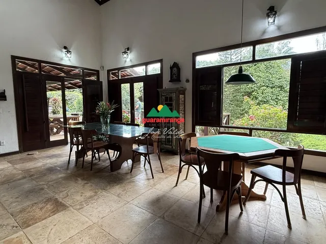 Imagem 12: CASA COM LAGO NO MEIO DA MONTANHA