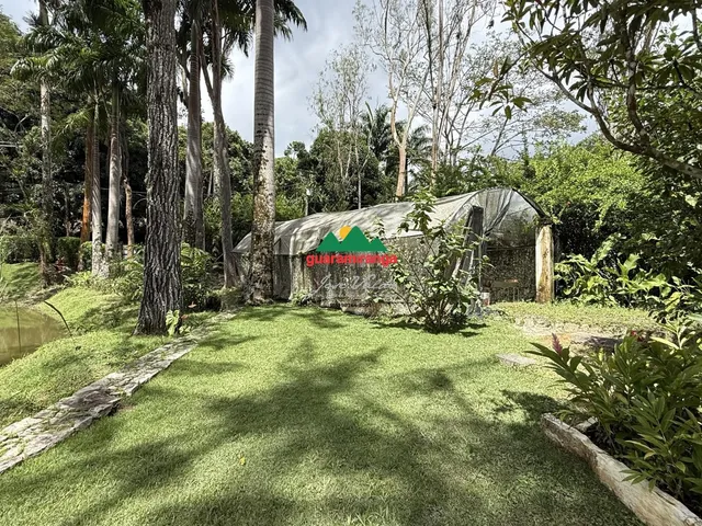 Imagem 3: CASA COM LAGO NO MEIO DA MONTANHA