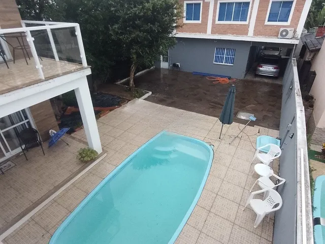 Imagem 10: Casa de 5 dormitórios, piscina e 4 vagas de garagem em Canoas