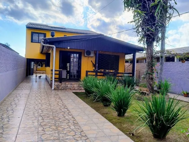 Imagem: Casa de 4 dormitórios e 4 vagas de garagem