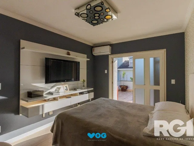Imagem 6: Casa em Condomínio com 3 Suítes, Espaço Gourmet e 5 Vagas de Garagem