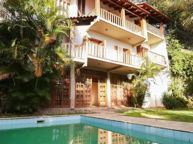Imagem: Casa à venda com 4 dormitorios no Bairro