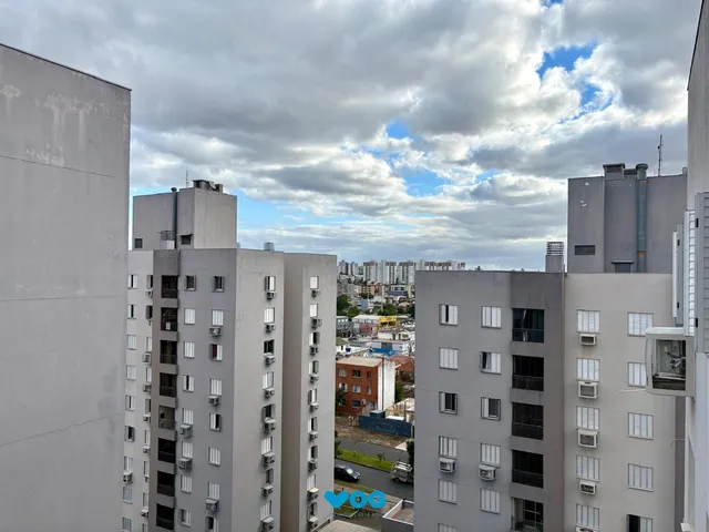 Imagem 14: Apartamento 2 dormitórios com sacada e churrasqueira e vaga de garagem coberta