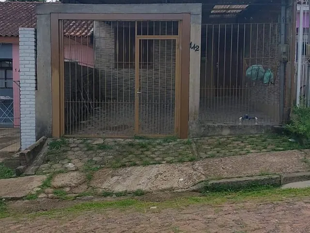 Imagem: A casa possui 2 Dormitórios, 1 Banheiro, 1 Vaga na