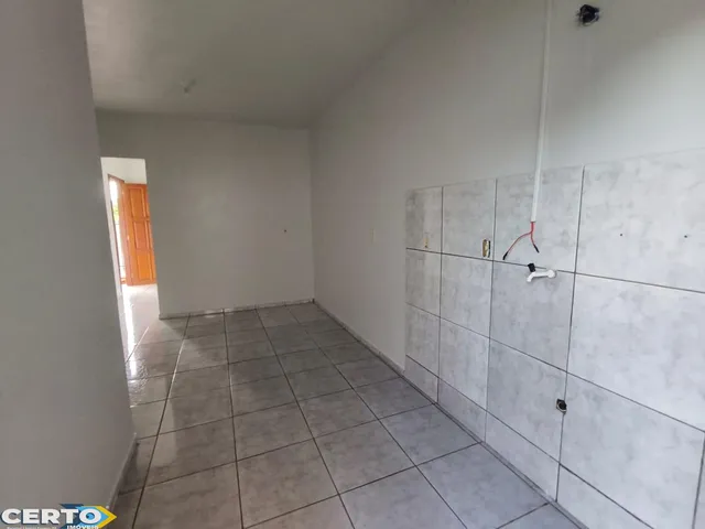 Imagem 3: Casa com 2 quartos, sala, cozinha, lavanderia, banheiro, garagem coberta