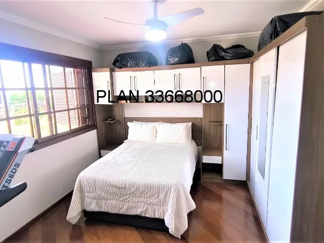 Imagem 11: Casa espaçosa com piscina e sistema fotovoltaico proporcionando economia